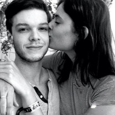 Sadie Newman kissing Cameron Monaghan on the cheek.